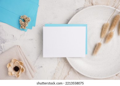 The Concept Of Wedding Invitation Cards, Dinner Invitations, Offices And Others. Blank Paper And Envelope, With White Cement Background.