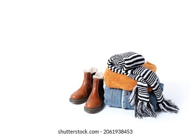 Concept of winter clothes isolated on white background.