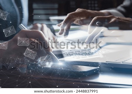 The concept of working on a computer while sending e-mail over a network.