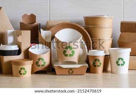 The concept of zero waste and recycling. Use of eco-friendly paper tableware and packaging made from biodegradable materials. [[stock_photo]] © 