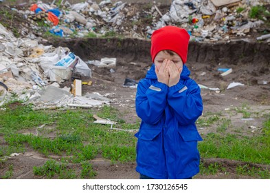 Conception - The Child Closes His Eyes In Horror So As Not To See Unauthorized Garbage Collection, Environmental Pollution, Violation Of The Law. Save The Planet For Our Children.