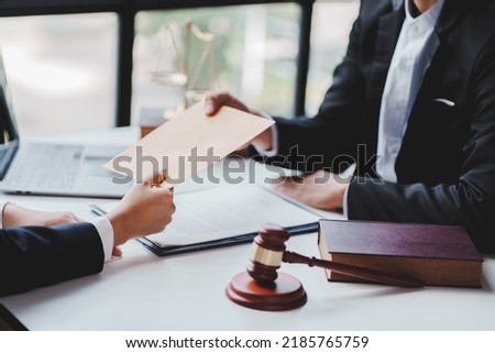 Concepts of corruption, bankruptcy courts, bail, crime, bribery, fraud, Judge Gavel, soundboard, and a handful of cash on the table. Foto stock © 