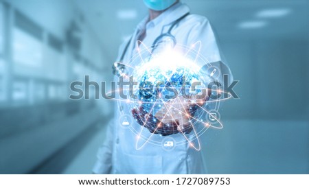 Concepts Doctors who work hard around the world to deter the outbreak of the virus, doctor holding earth with icon medical and people health care global network.