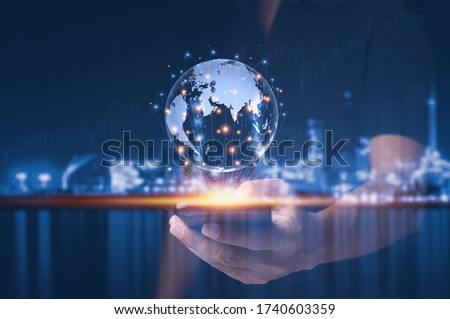 Concepts of global business connections. Asian businessman using smartphones connect and contact group of business partner around the world