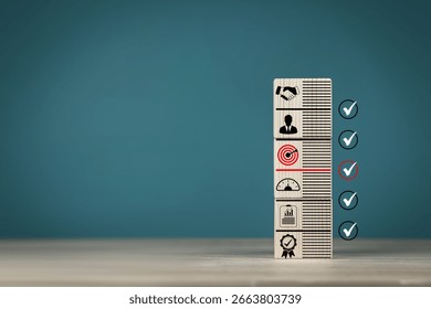Concepts of methods for developing organizations towards success. Business icons on wooden blocks represent establishing strategy and implementing plan. with copy space