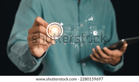 Concepts of setting goals and developing business guidelines for success. Businessman analyzing customer data and marketing strategy. 