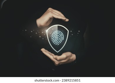 Concepts of system security using fingerprint. Hands protect shield gesture with a fingerprint.