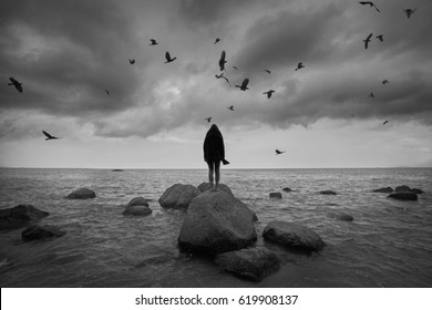 Conceptual Art Black And White Photo With Ocean Raven And Alone Man 