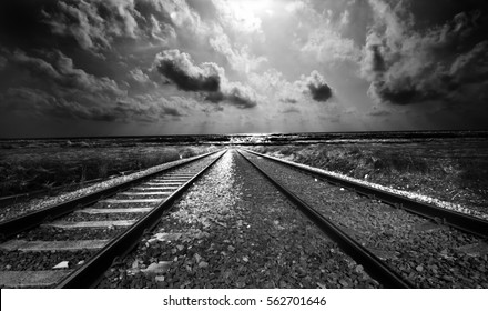 Conceptual Black And White Railway Track Image Depicting Travel, Journey, Adventure Or End Of The Line. 