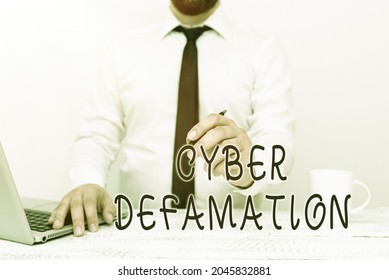 Conceptual Caption Cyber Defamation. Business Concept Slander Conducted Via Digital Media Usually By Internet Remote Office Work Online Presenting Business Plan And Designs