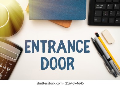 Conceptual Caption Entrance Door. Word Written On Way In Doorway Gate Entry Incoming Ingress Passage Portal Office Supplies Over Desk With Keyboard And Glasses And Coffee Cup For Working