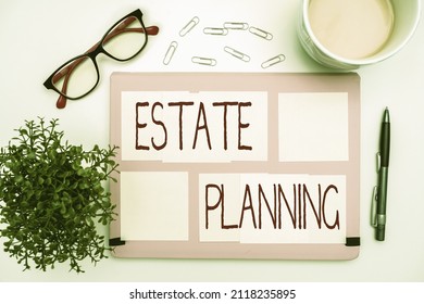 Conceptual Caption Estate Planning. Business Approach The Management And Disposal Of That Person S Is Estate Office Supplies Over Desk With Keyboard And Glasses And Coffee Cup For Working