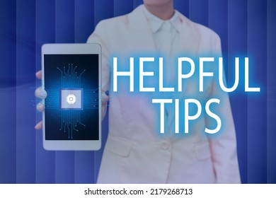 Conceptual caption Helpful Tips. Concept meaning Ask an Expert Solutions Hints Consulting Warning Lady Pressing Screen Of Mobile Phone Showing The Futuristic Technology