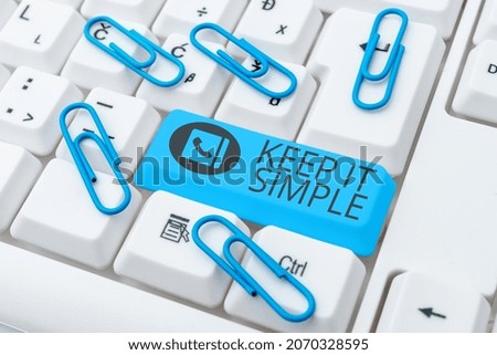 Conceptual caption Keep It Simple. Concept meaning ask something easy understand not go into too much detail Writing Comments On A Social Media Post, Typing Interesting New Article