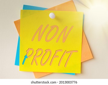 Conceptual Caption Non Profit. Business Approach An Activity Not Making Or Conducted Primarily For A Profit Colorful Paper Notes Stacked Together And Pinned On The Wall.