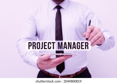 Conceptual caption Project Manager. Internet Concept overall charge of the planning and execution of a project Presenting New Technology Ideas Discussing Technological Improvement