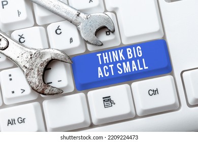 Conceptual Caption Think Big Act Small. Business Concept Great Ambitious Goals Take Little Steps One At A Time