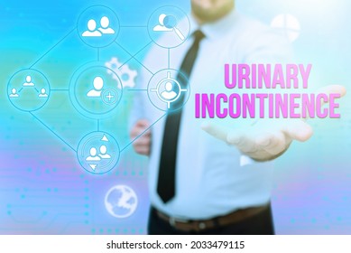 Conceptual Caption Urinary Incontinence. Business Idea Uncontrolled Leakage Of Urine Loss Of Bladder Control Gentelman Uniform Standing Holding New Futuristic Technologies.