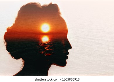Conceptual codependency double exposure. Sunrise in the woman head. - Shutterstock ID 1605988918