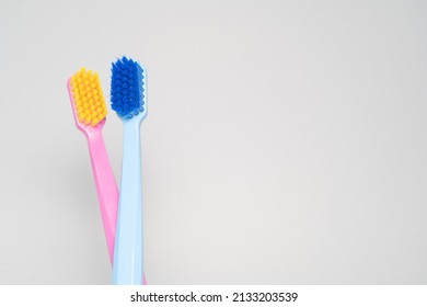 A conceptual of a couple toothbrush in love. Toothbrushes convey the human relationship between a man and a woman.