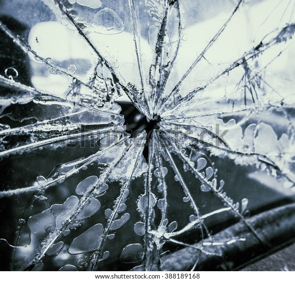 Conceptual Crime\
Image Of A Smashed Truck\
Window