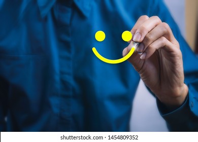 Conceptual the customer responded to the survey. The client using digital pen write happy face smile icon. Depicts that customer is very satisfied. Service experience and satisfaction concept. - Shutterstock ID 1454809352
