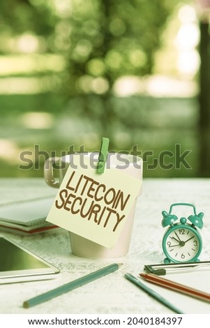 Conceptual display Litecoin Security. Word Written on peertopeer cryptocurrency and opensource software Outdoor Coffee And Refresment Shop Ideas, Cafe Working Experience