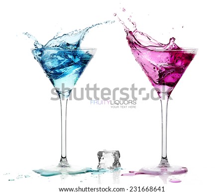 Conceptual Elegant Martini Glasses with Splashing Colored Cocktails with Ice Cube on the Table. Isolated on White Background with Copy Space at the Center. Template design with Sample Text