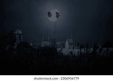 Conceptual image about life and death seeing old European cemetery, church and two tropical palm trees in an overcast full moon night - Powered by Shutterstock