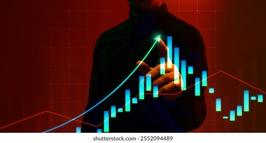 Conceptual image of businessman pointing at rising data trends, candlestick charts on digital interface, symbolizing growth and success. Concept of business, analytics, technology, financial industry
