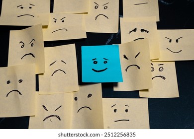 A Conceptual image made with post-its representing hope or joy surrounded by sadness, anger and hopelessness.