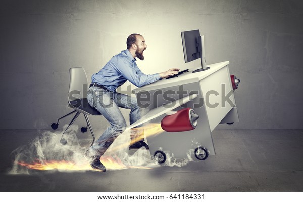 conceptual image, methaphor of busy and fast\
business, man with airplane\
desk