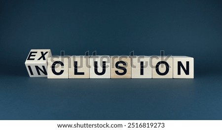 A conceptual image representing the choice between exclusion and inclusion. The words 'exclusion' and 'inclusion' on wooden blocks highlight the contrasting outcomes of these two approaches