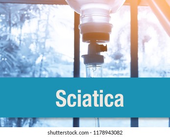 Conceptual image with Sciatica inscription with the view of intravenous fluid and injection drug on the white background. Medical Conceptual. Copy space.