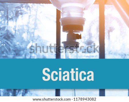 Conceptual image with Sciatica inscription with the view of intravenous fluid and injection drug on the white background. Medical Conceptual. Copy space.