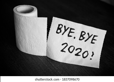 Conceptual image of toilet paper, symbol of covid-19 crisis and pandemia in 2020. Abstract image, saying goodbye to the bad year, leaving the past behind, hoping for better. - Shutterstock ID 1837098670