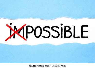 Conceptual Motivational Image About Turning The Impossible Into Possible Handwritten On Paper. 