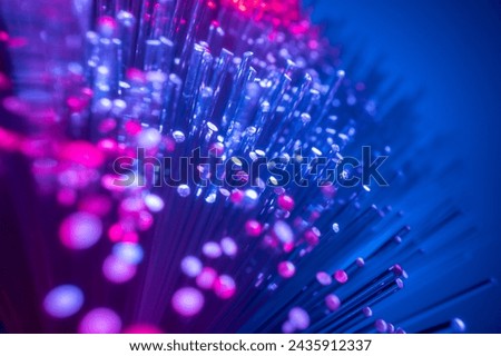 Conceptual multicolored image with short focal length fiber optic network cable for fast communication. Close-up
