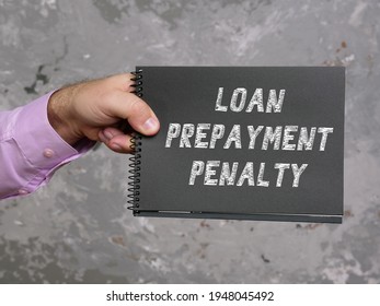 Conceptual photo about LOAN PREPAYMENT PENALTY with handwritten phrase. 