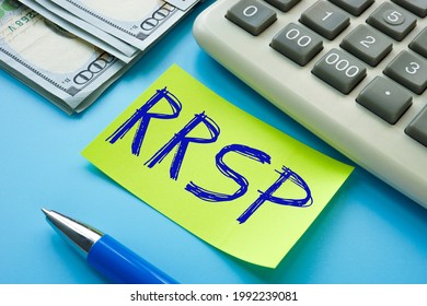 Conceptual Photo About RRSP Registered Retirement Savings Plan With Written Text. 
