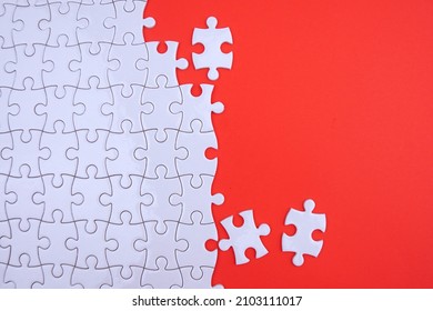 Conceptual Photo Of Copyspace Red Background Missing Jigsaw Puzzle. Image For Motivation, Inspiration And Consultation, Ideation Concept..