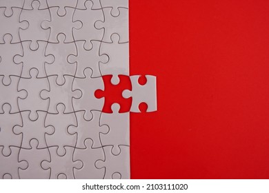 Conceptual Photo Of Copyspace Red Background Missing Jigsaw Puzzle. Image For Motivation, Inspiration And Consultation, Ideation Concept..