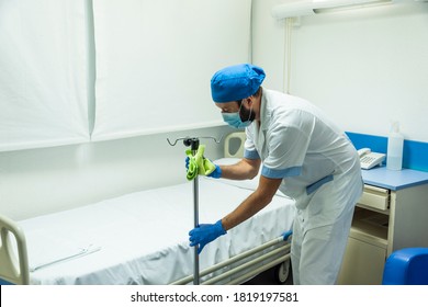 Conceptual Photo Of A Hospital Worker Cleaning A Patient Room