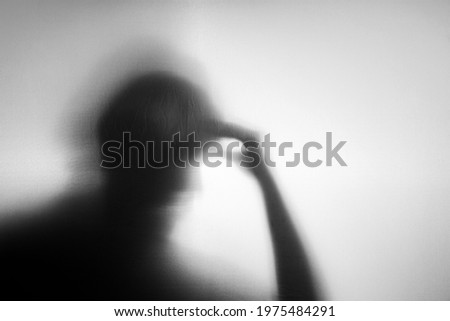 Conceptual Photo. Motion Blurred image. Silhouette of Senior Elderly Person who as Parkinson or Alzheimer Disease. Memory Loss from Dementia. Brain Function Decline