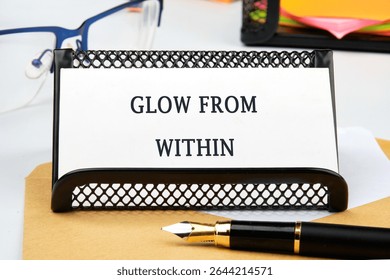 The conceptual phrase GLOW FROM WITHIN.