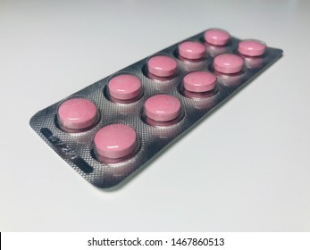 Conceptual Shot Of Red Vitamin Medication Tablets Made Of Baht Heaven Compositions On White Background Buying Medicine Health Living B12 Vitamins. 