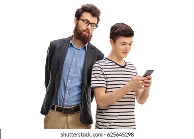 Concerned Father Peeking At The Phone Of His Son Isolated On White Background