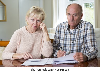 Concerned Senior Couple Reviewing Domestic Finances