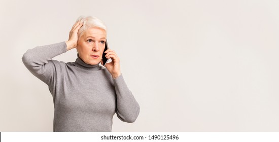 Concerned Woman Talking On Phone, Holding Hand On Head In Stress, Panorama With Copy Space