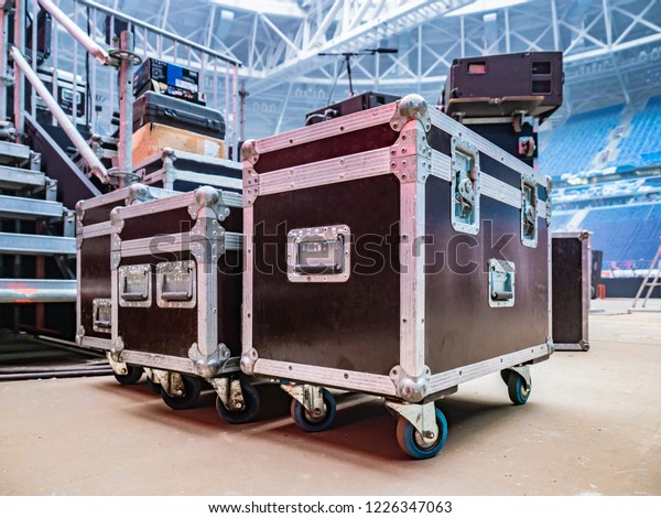 Concert activity. Cases for\
transportation of equipment. Stage equipment. Boxes on the\
wheels.